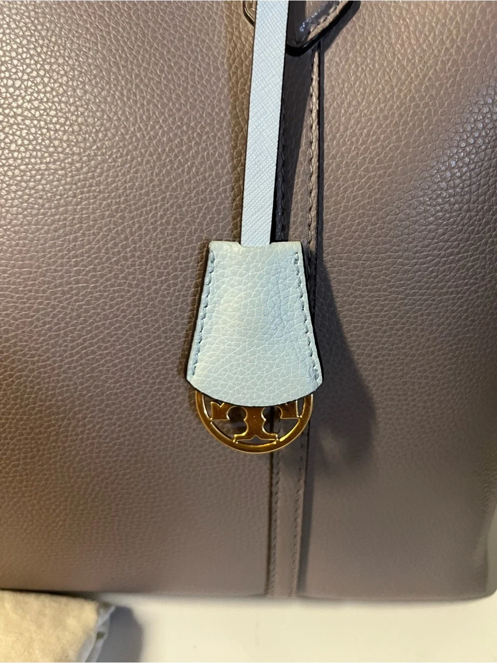 Tory Burch Taupe Pebbled Leather Tote with Light Blue Charm